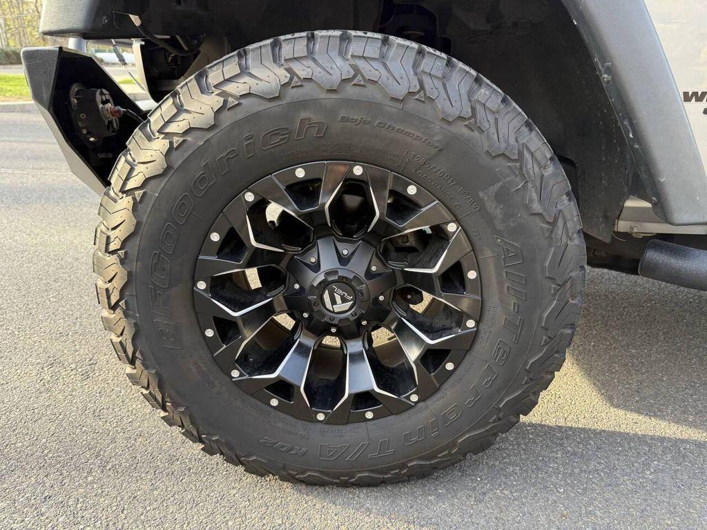 used 2014 Jeep Wrangler Unlimited car, priced at $16,495