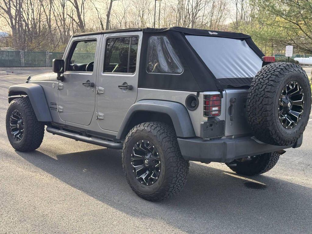 used 2014 Jeep Wrangler Unlimited car, priced at $16,495