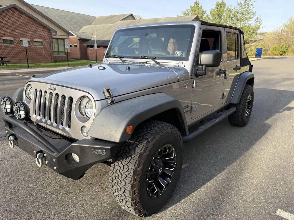 used 2014 Jeep Wrangler Unlimited car, priced at $16,495