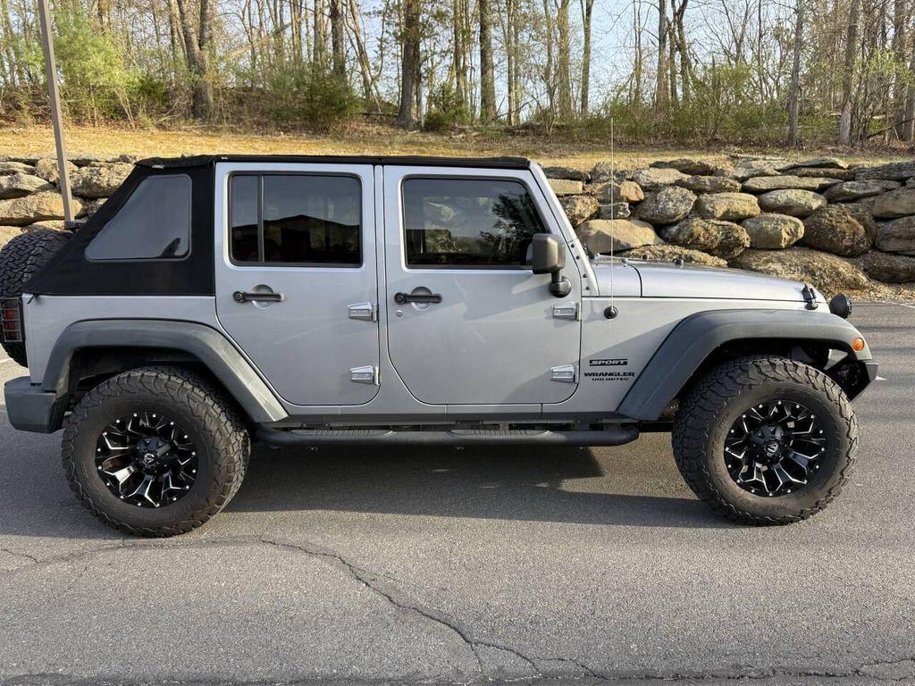 used 2014 Jeep Wrangler Unlimited car, priced at $16,495