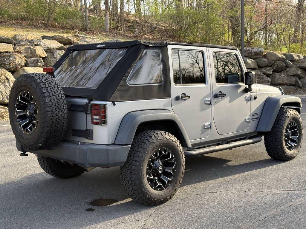 used 2014 Jeep Wrangler Unlimited car, priced at $16,495