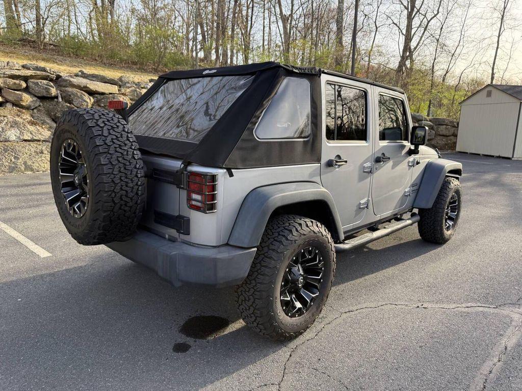 used 2014 Jeep Wrangler Unlimited car, priced at $16,495