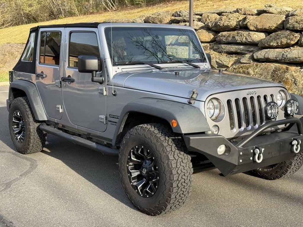 used 2014 Jeep Wrangler Unlimited car, priced at $16,495
