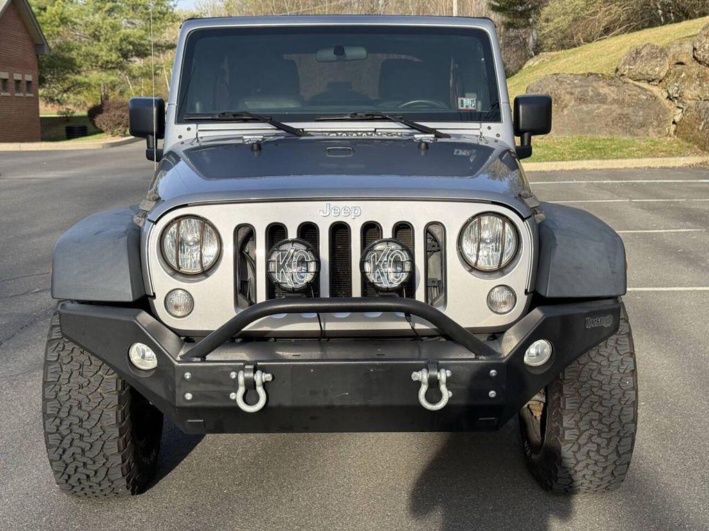 used 2014 Jeep Wrangler Unlimited car, priced at $16,495
