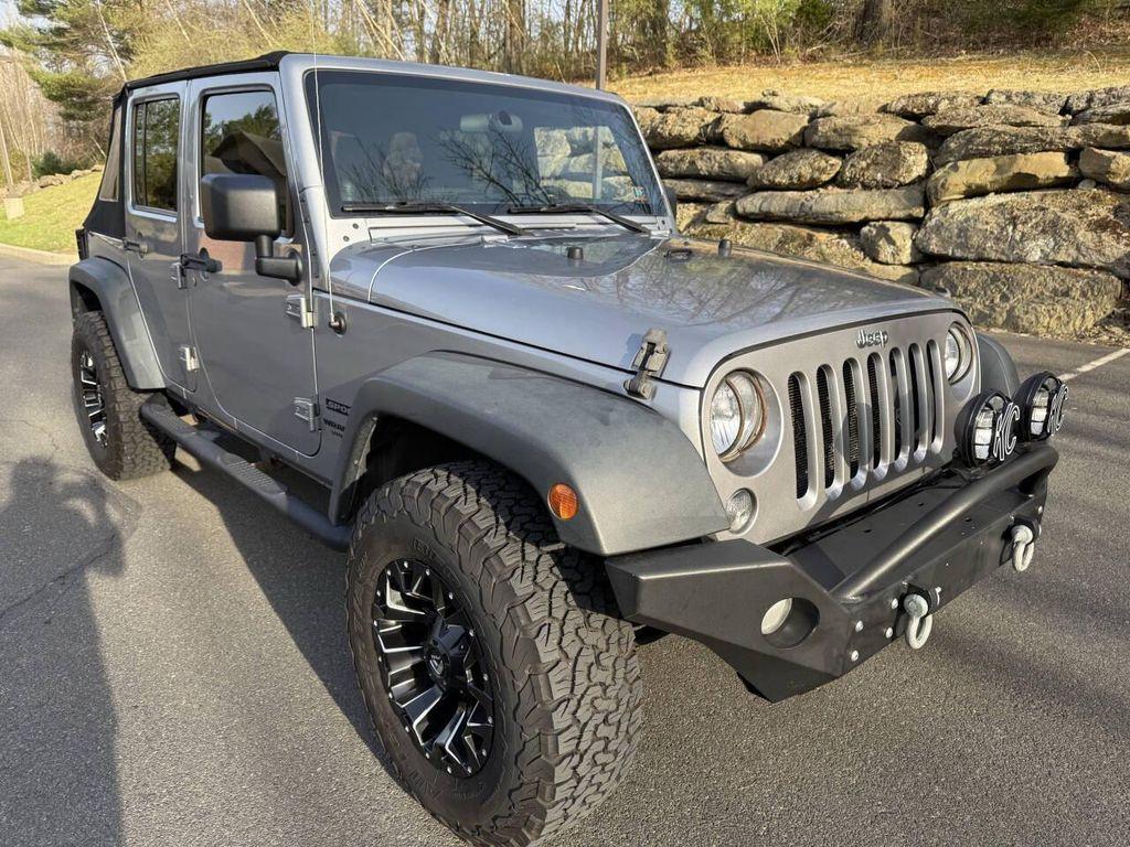 used 2014 Jeep Wrangler Unlimited car, priced at $16,495