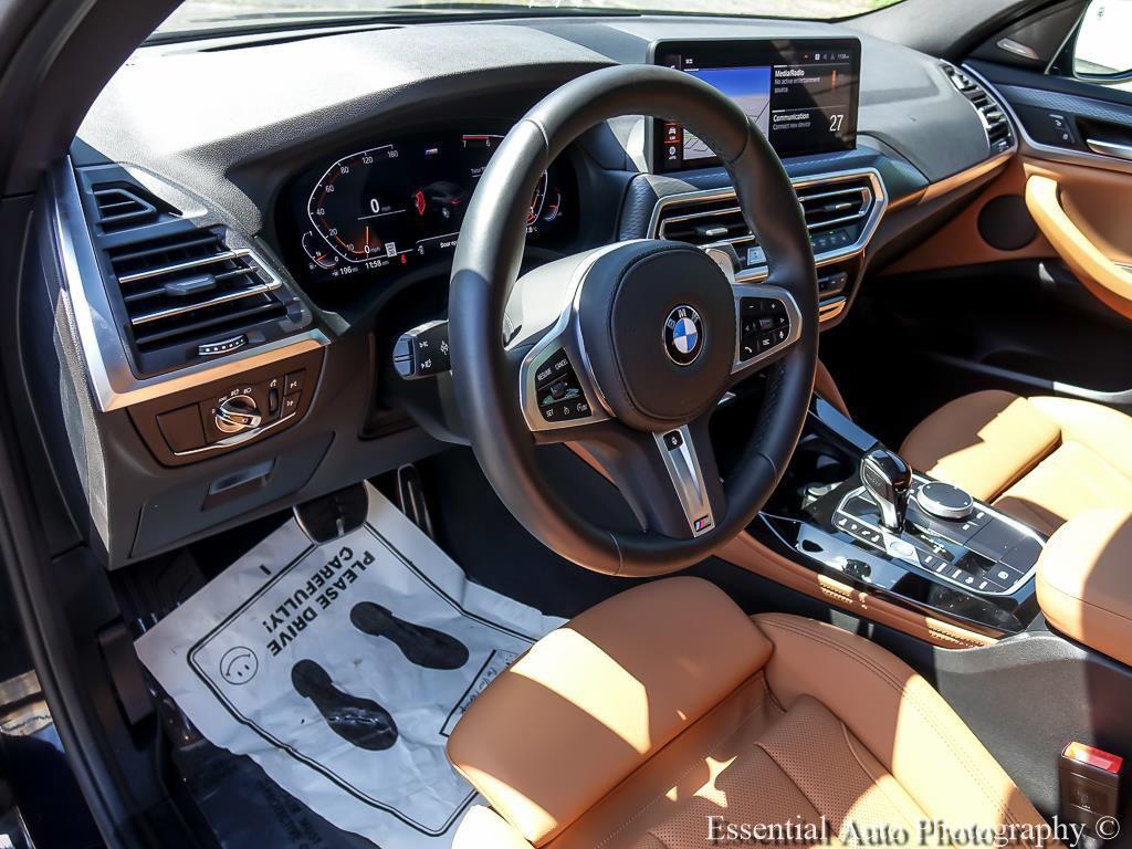 used 2024 BMW X4 car, priced at $49,372