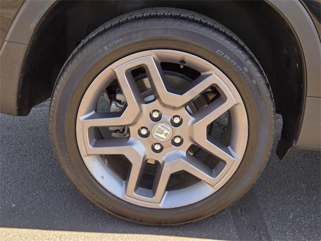 2023 Crystal Black Pearl Honda Passport