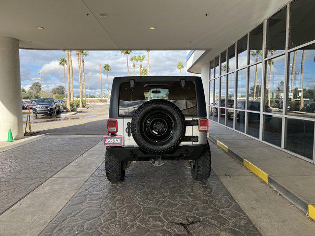 used 2016 Jeep Wrangler Unlimited car, priced at $16,617