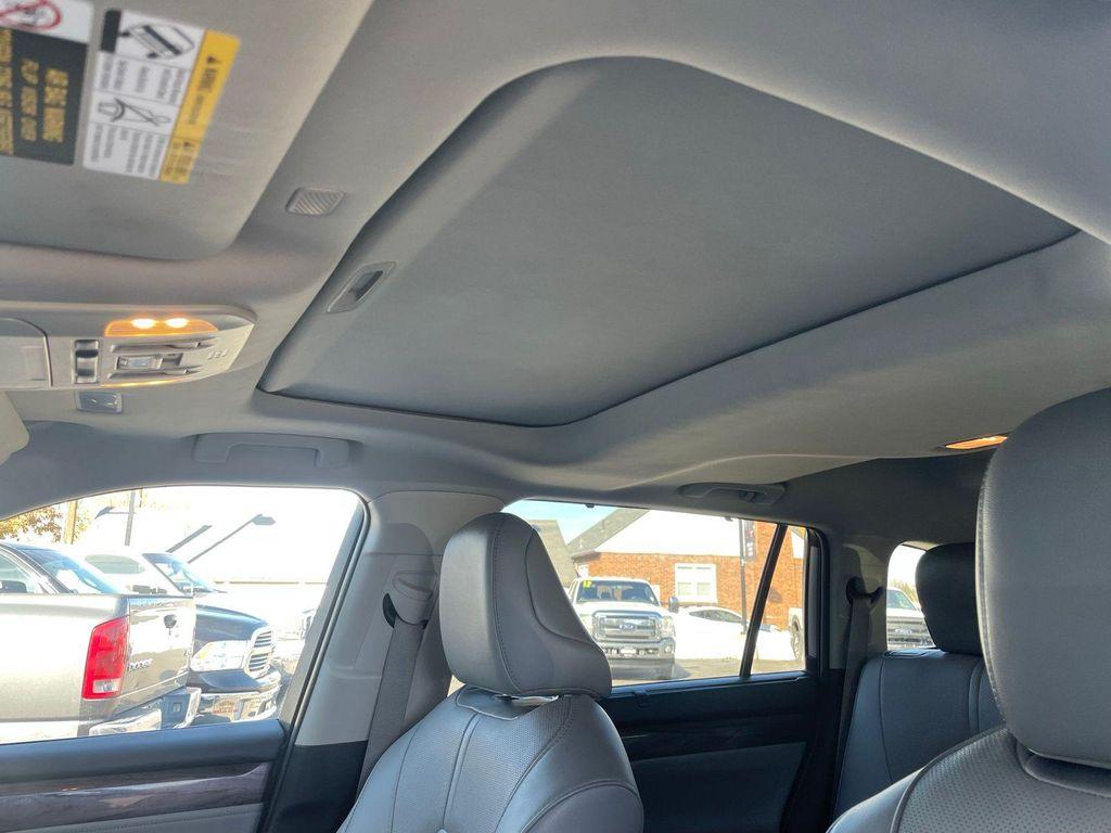 used 2020 Toyota Highlander Hybrid car, priced at $24,126