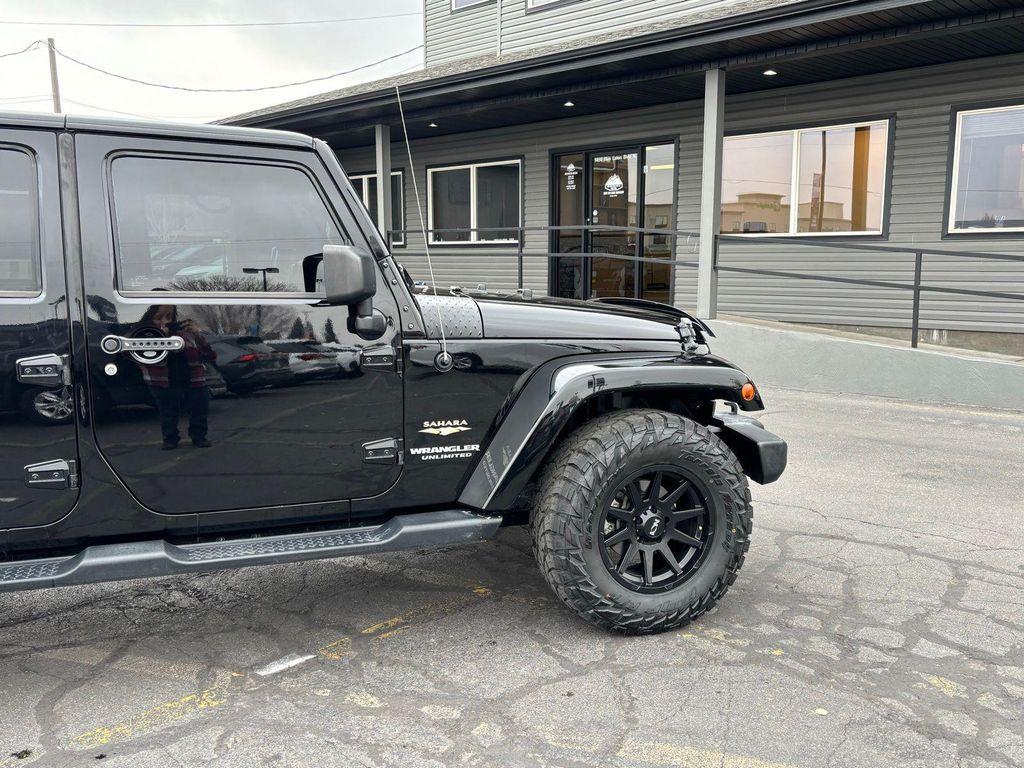 used 2015 Jeep Wrangler Unlimited car, priced at $16,999