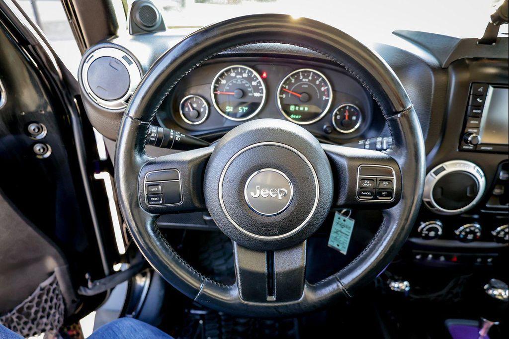 used 2013 Jeep Wrangler Unlimited car, priced at $16,775