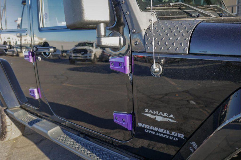 used 2013 Jeep Wrangler Unlimited car, priced at $16,775