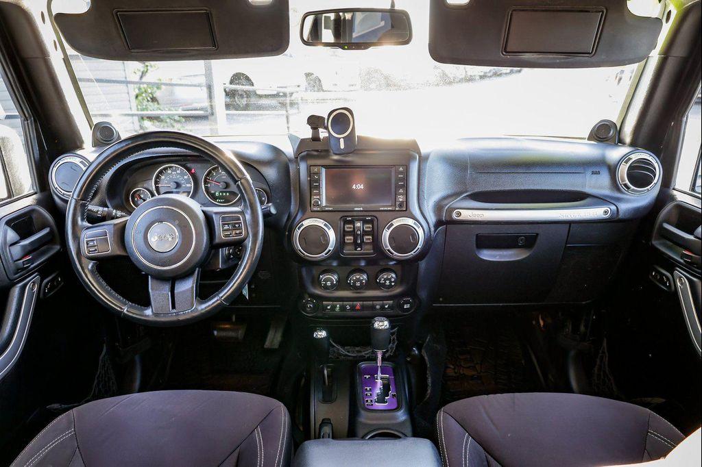 used 2013 Jeep Wrangler Unlimited car, priced at $16,775