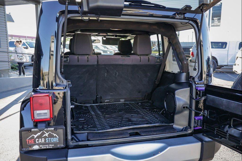 used 2013 Jeep Wrangler Unlimited car, priced at $16,775