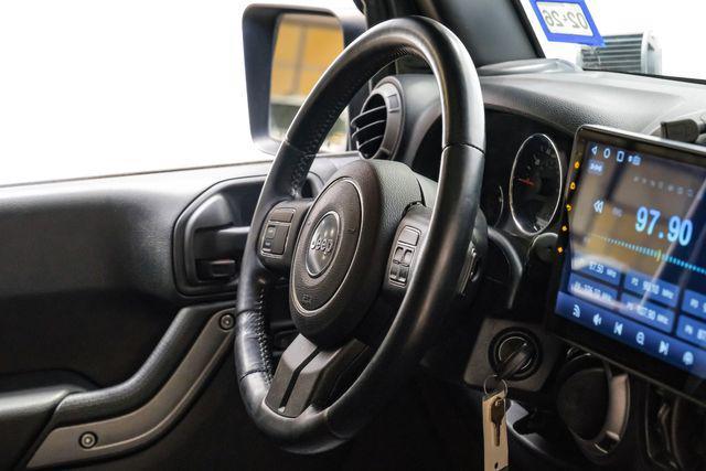 used 2015 Jeep Wrangler Unlimited car, priced at $16,383