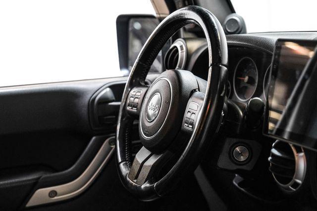 used 2012 Jeep Wrangler Unlimited car, priced at $16,883