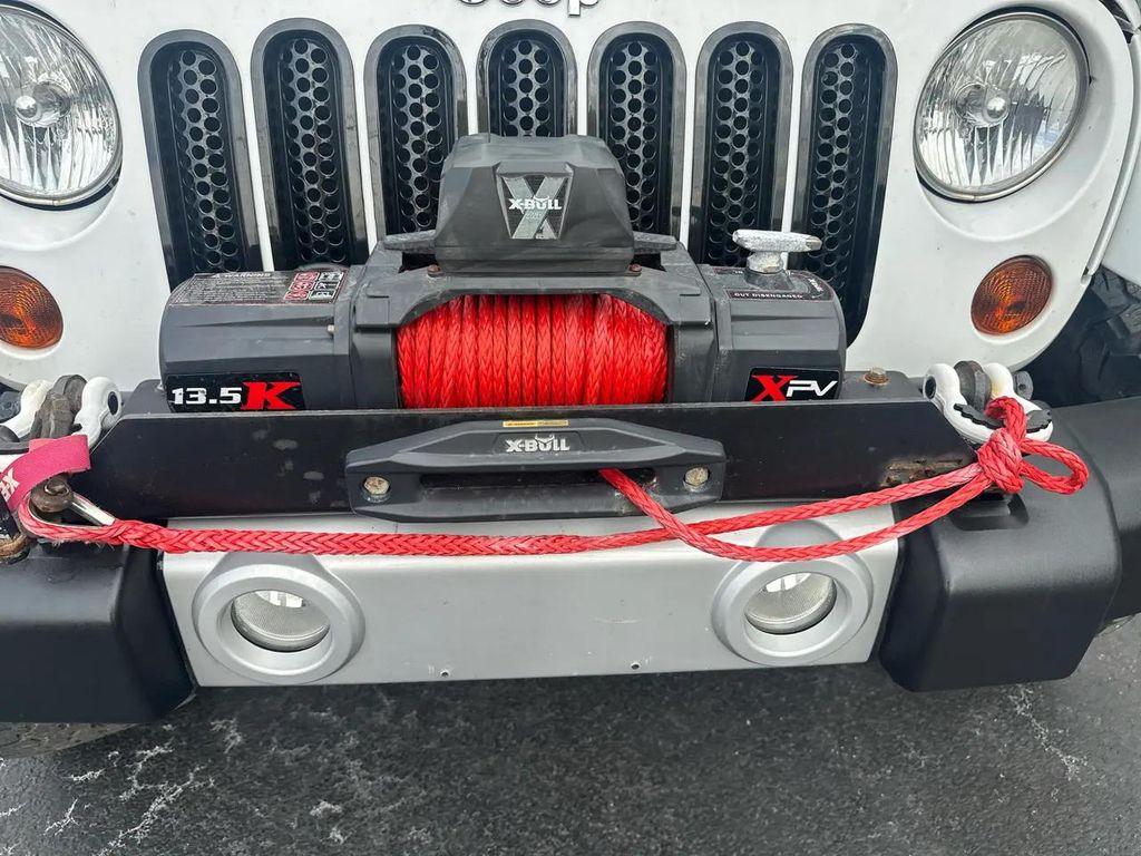 used 2013 Jeep Wrangler Unlimited car, priced at $19,905