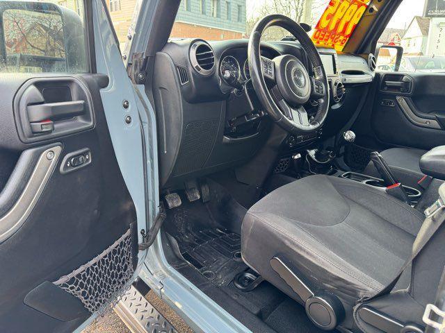 used 2015 Jeep Wrangler Unlimited car, priced at $9,995