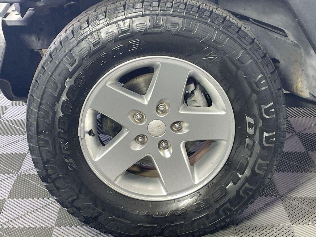 used 2013 Jeep Wrangler Unlimited car, priced at $13,488