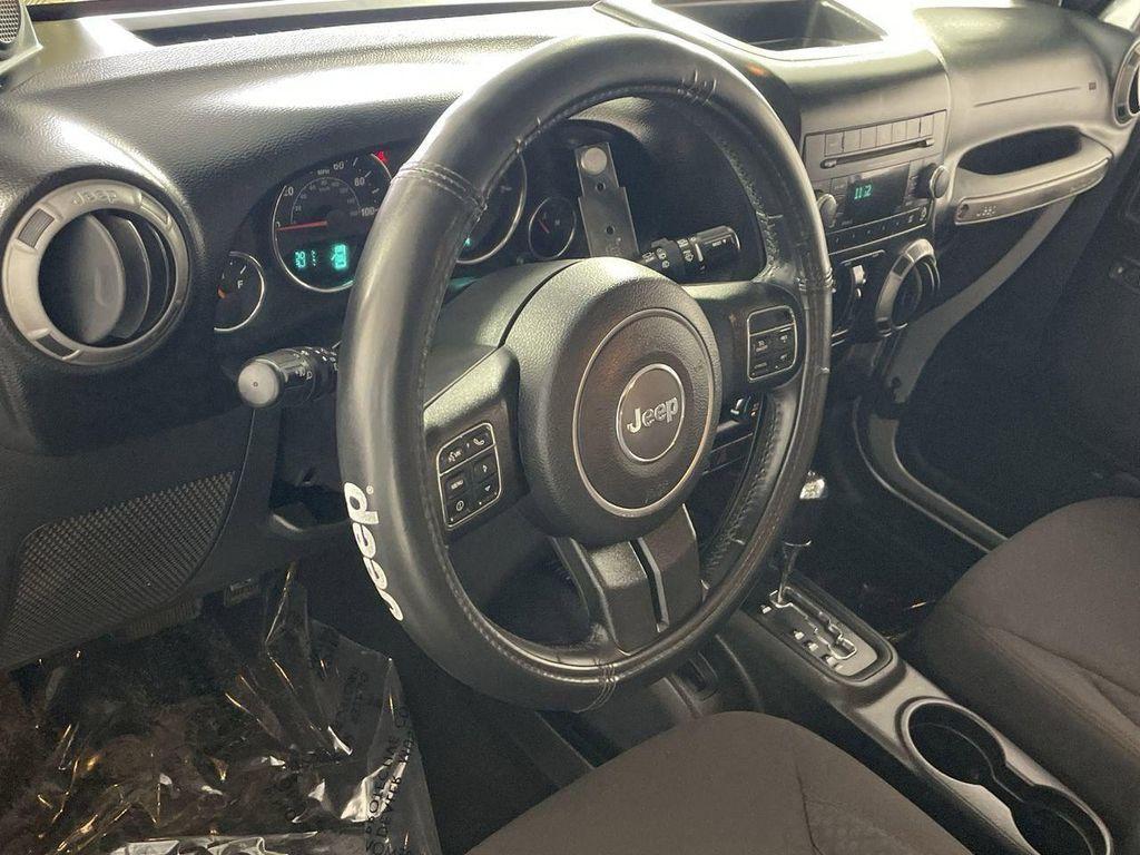 used 2013 Jeep Wrangler Unlimited car, priced at $13,488