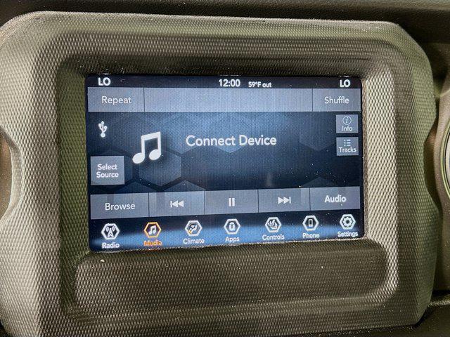 used 2023 Jeep Wrangler 4xe car, priced at $26,997