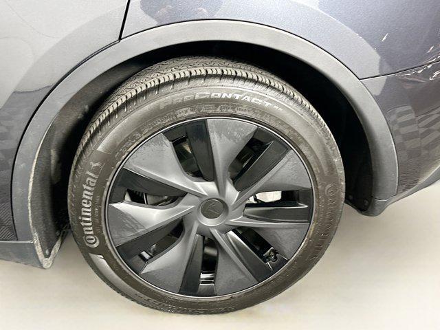 used 2025 Tesla Model Y car, priced at $36,496