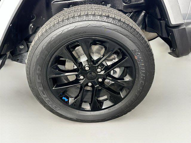 used 2023 Jeep Wrangler 4xe car, priced at $27,496