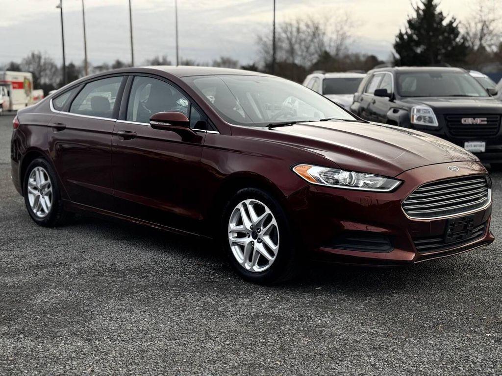 used 2015 Ford Fusion car, priced at $5,995
