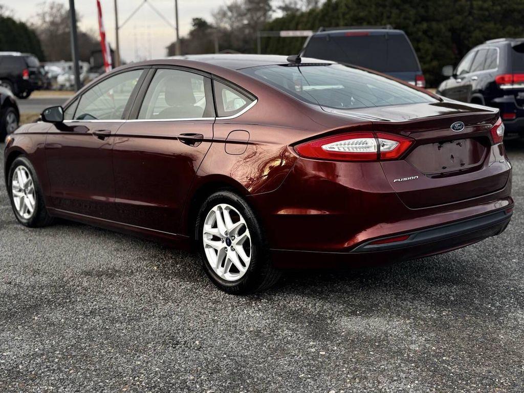 used 2015 Ford Fusion car, priced at $5,995
