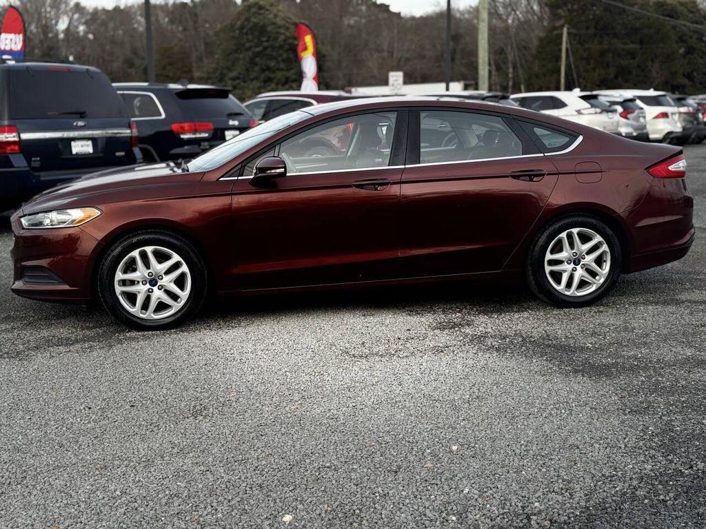 used 2015 Ford Fusion car, priced at $5,995