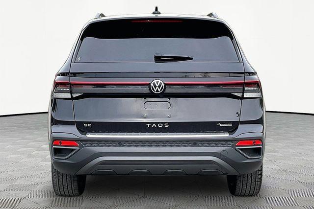 used 2025 Volkswagen Taos car, priced at $25,084