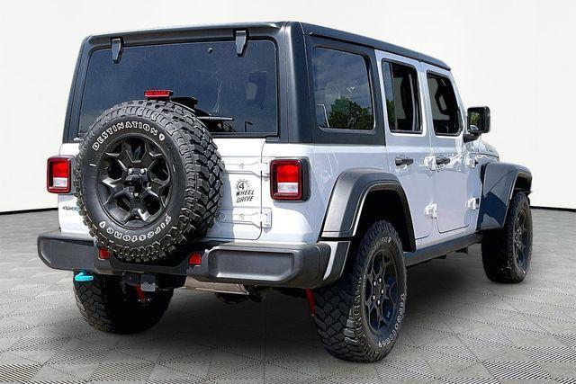 used 2023 Jeep Wrangler 4xe car, priced at $27,608