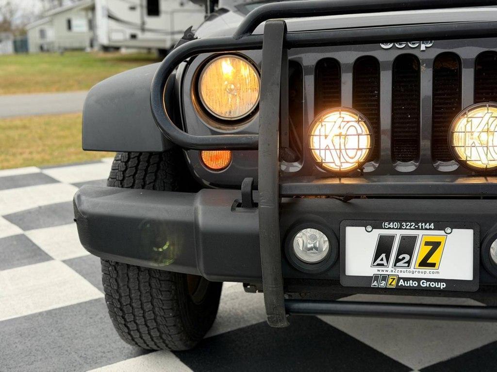 used 2014 Jeep Wrangler Unlimited car, priced at $13,980