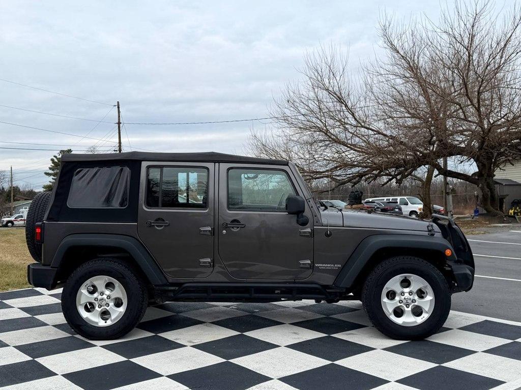used 2014 Jeep Wrangler Unlimited car, priced at $13,980