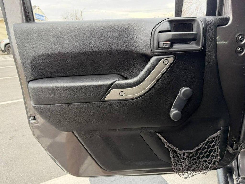 used 2014 Jeep Wrangler Unlimited car, priced at $13,980