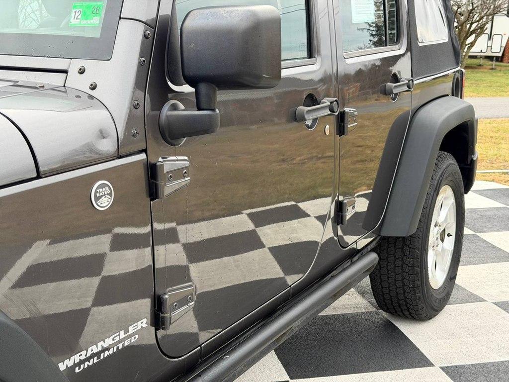 used 2014 Jeep Wrangler Unlimited car, priced at $13,980