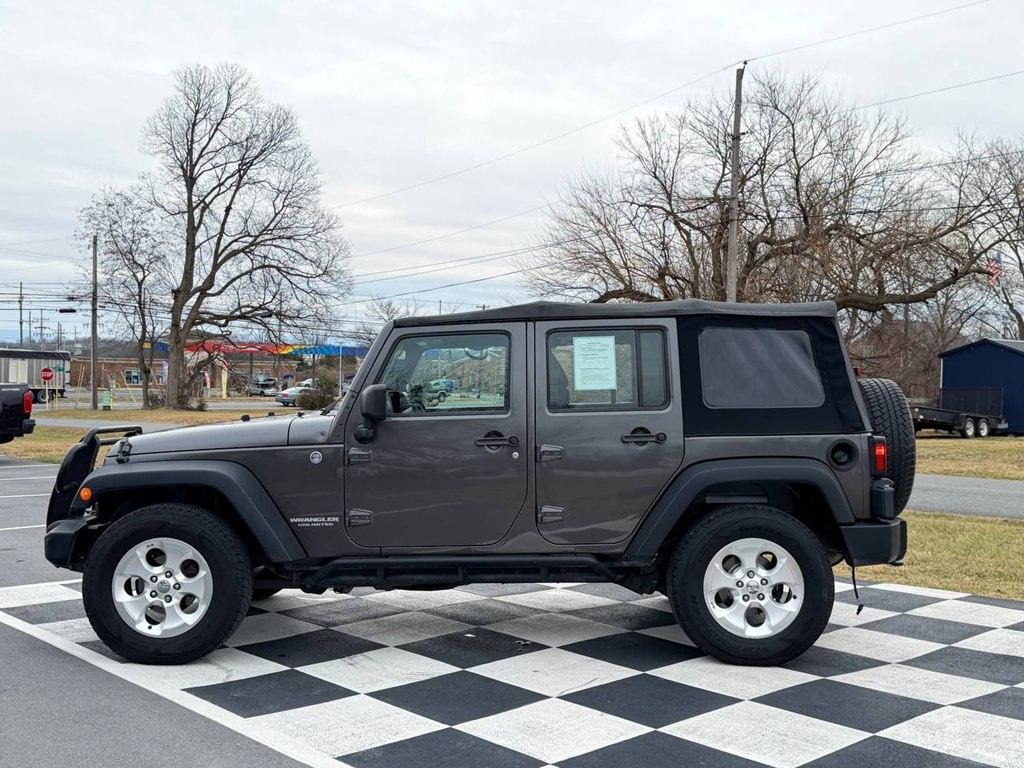 used 2014 Jeep Wrangler Unlimited car, priced at $13,980
