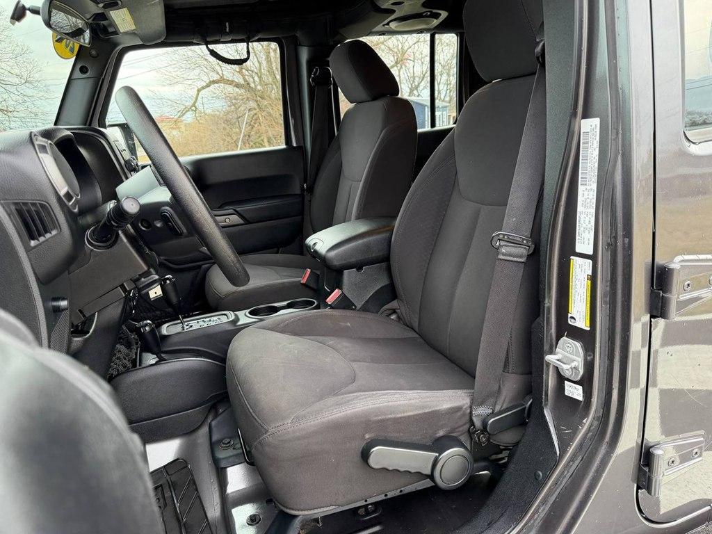 used 2014 Jeep Wrangler Unlimited car, priced at $13,980