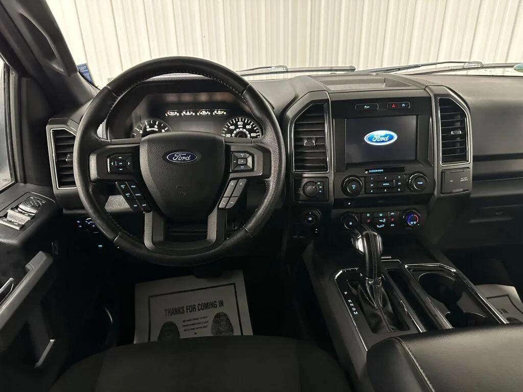 used 2018 Ford F-150 car, priced at $21,396