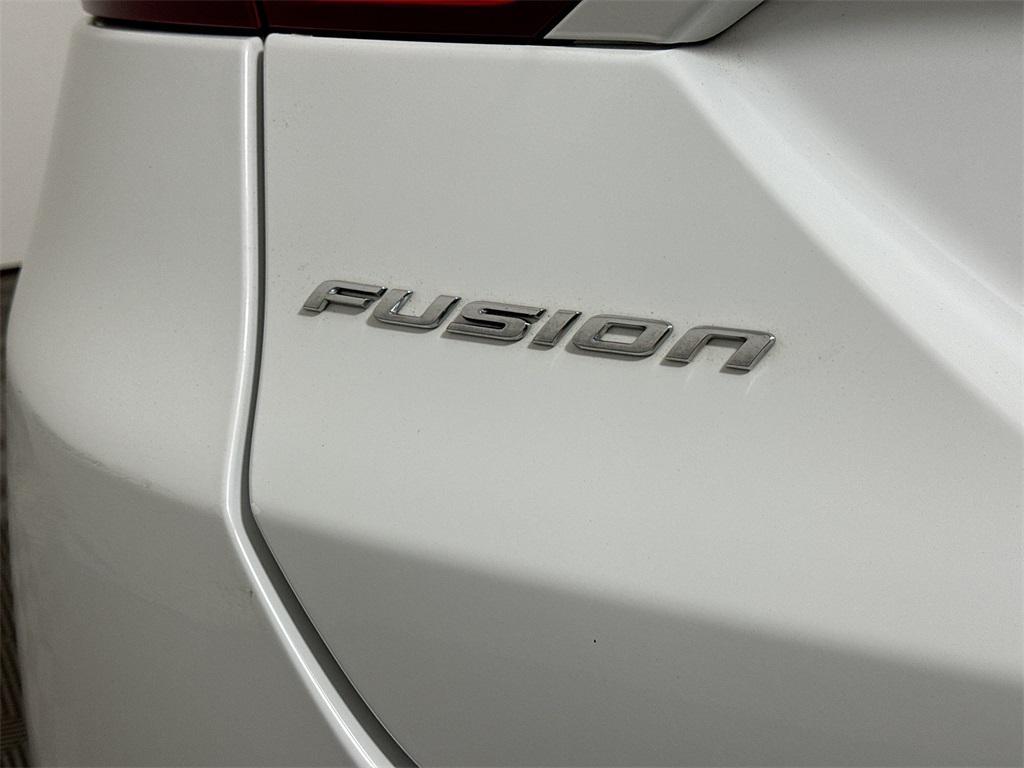 used 2014 Ford Fusion car, priced at $6,497