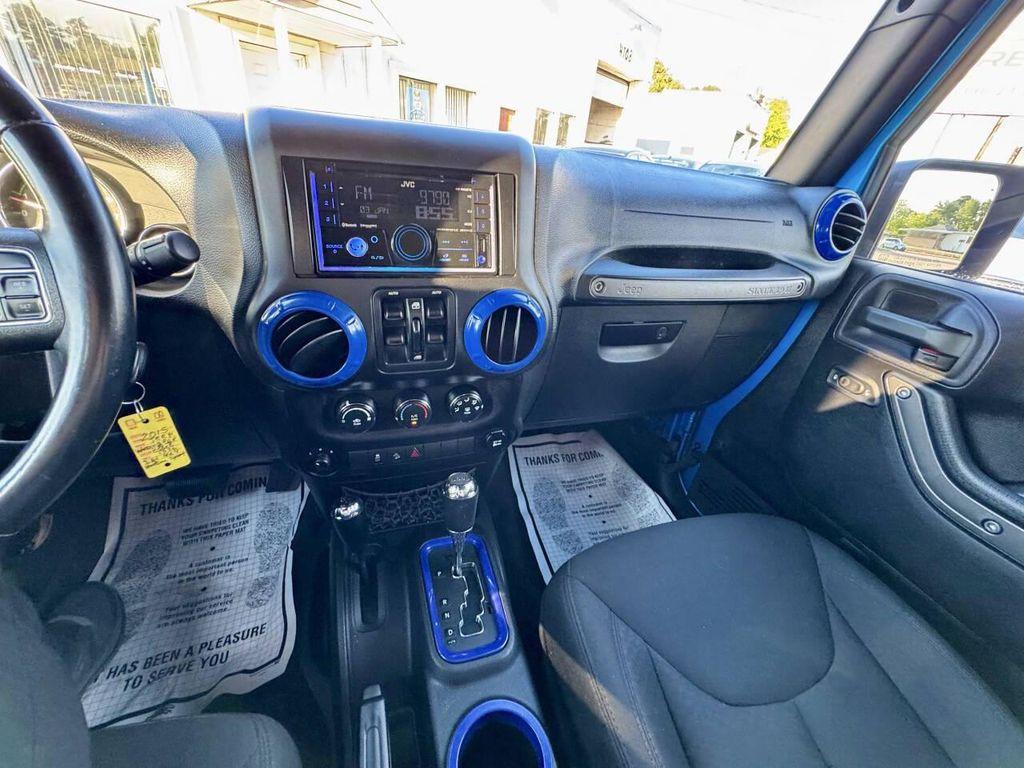 used 2015 Jeep Wrangler Unlimited car, priced at $13,495