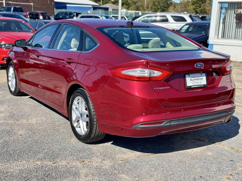 used 2014 Ford Fusion car, priced at $7,495