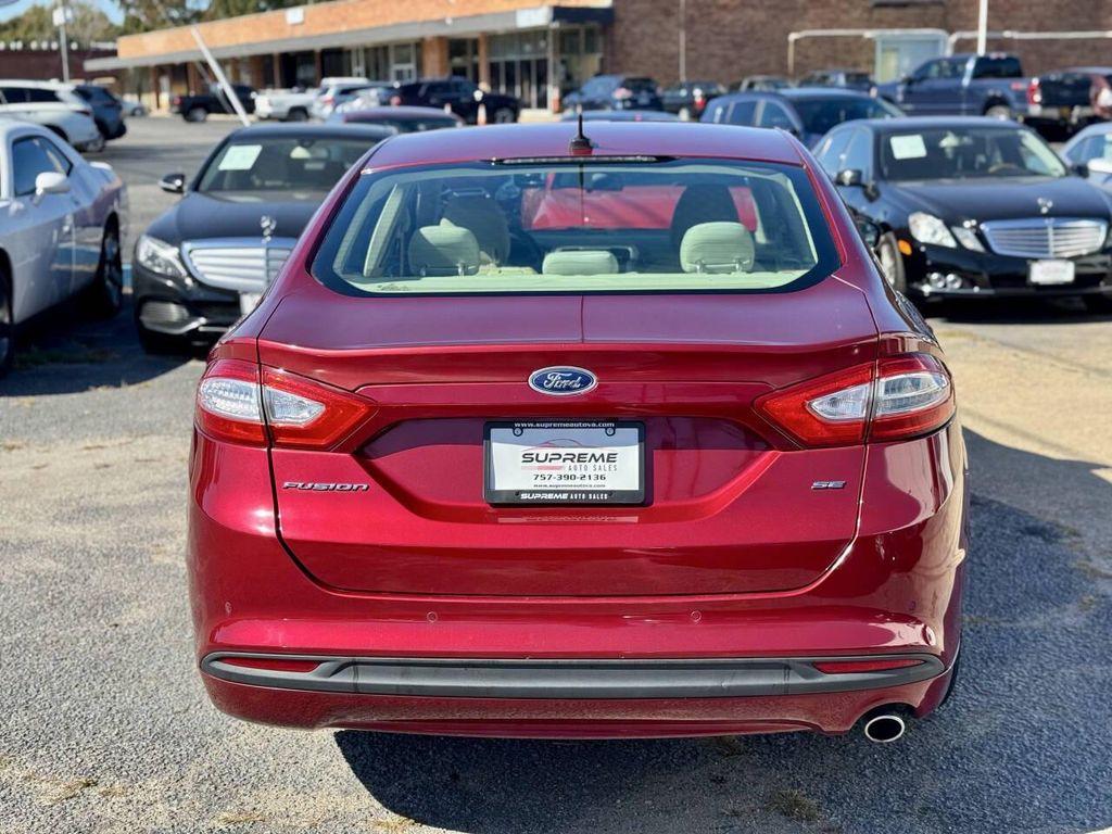 used 2014 Ford Fusion car, priced at $7,495