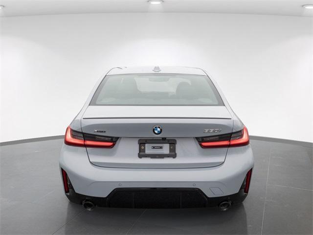 new 2026 BMW 330 car, priced at $59,940