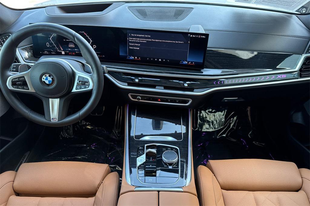 used 2026 BMW X5 car, priced at $74,995
