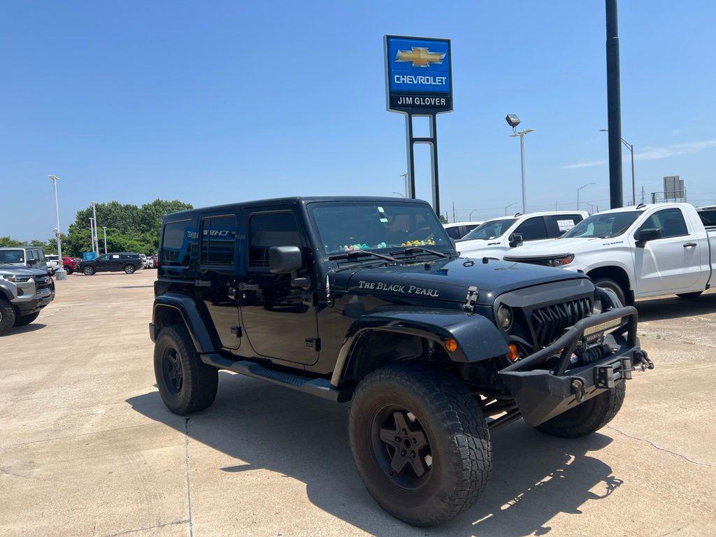 used 2013 Jeep Wrangler Unlimited car, priced at $15,032