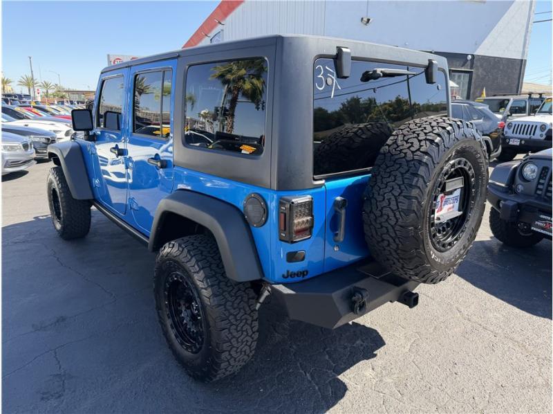 used 2015 Jeep Wrangler Unlimited car, priced at $15,395