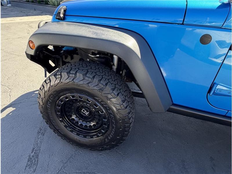 used 2015 Jeep Wrangler Unlimited car, priced at $15,395