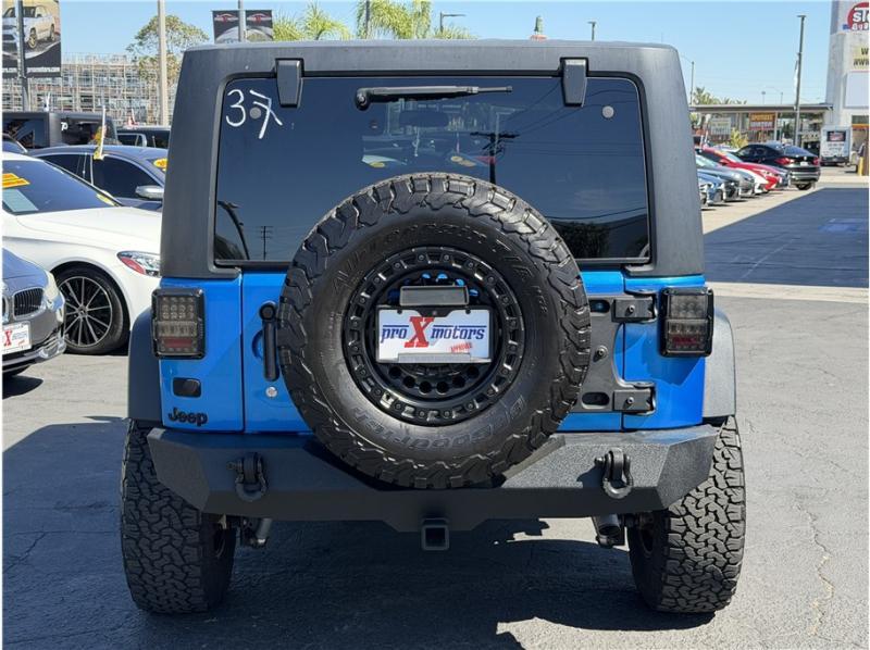 used 2015 Jeep Wrangler Unlimited car, priced at $15,395