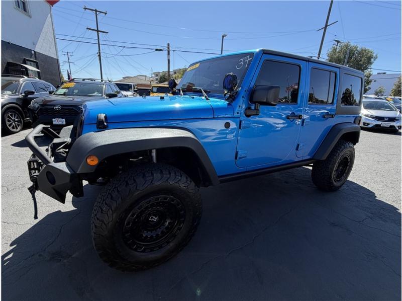used 2015 Jeep Wrangler Unlimited car, priced at $15,395